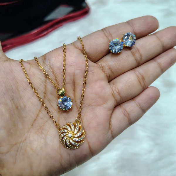necklace with matching radiant crystal stud earrings.
