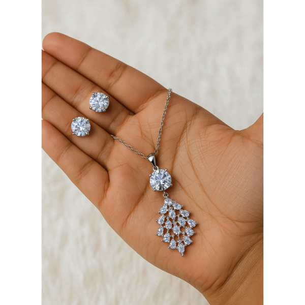 necklace with matching radiant crystal stud earrings.