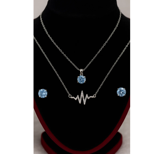 necklace with matching radiant crystal stud earrings.