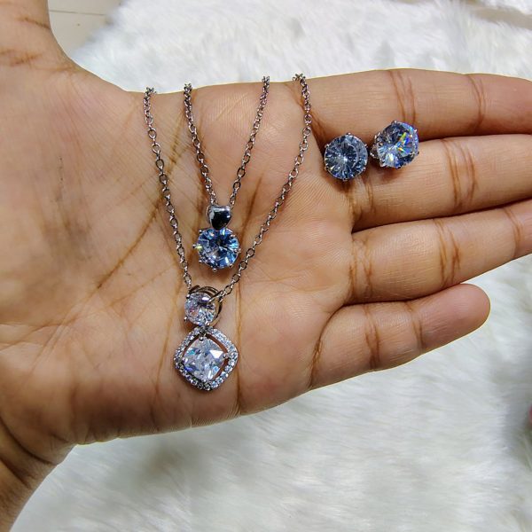 necklace with matching radiant crystal stud earrings.
