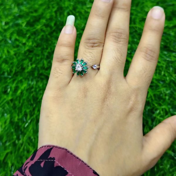 spinning blossom green stone ring