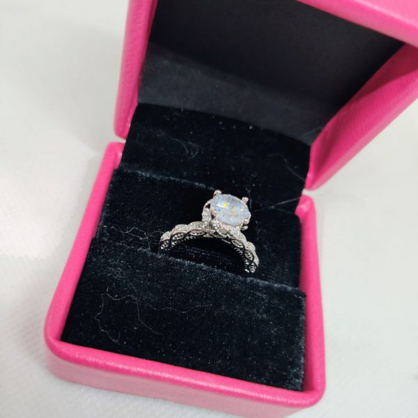 luminous embrace brilliant center stone with twisted band womens ring
