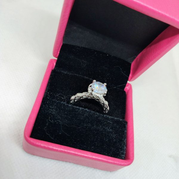 luminous embrace brilliant center stone with twisted band womens ring