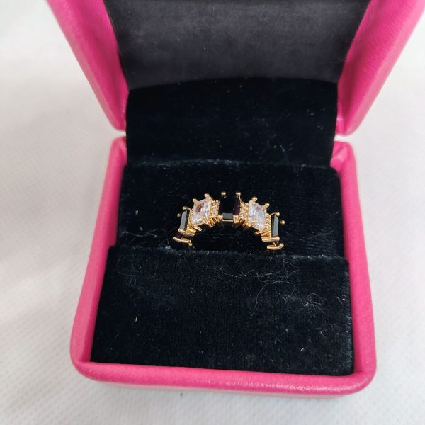 vibrant gold ring adorned with colorful gemstones.
