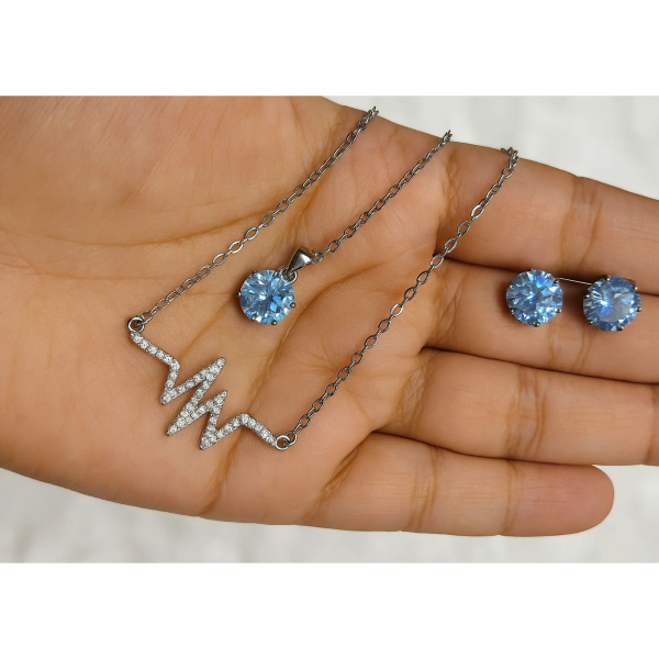 necklace with matching radiant crystal stud earrings.
