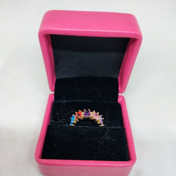 vibrant gold ring adorned with colorful gemstones,