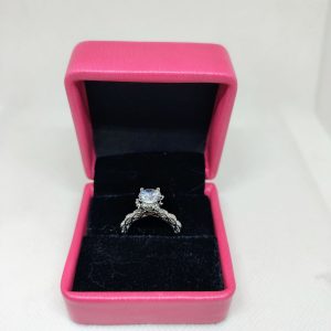 Luminous Embrace Brilliant Center Stone with Twisted Band Womens Ring