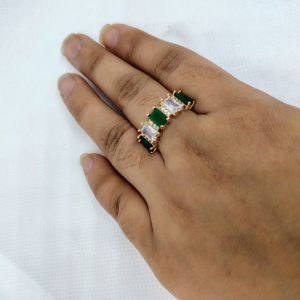 vibrant gold ring adorned with colorful gemstones,